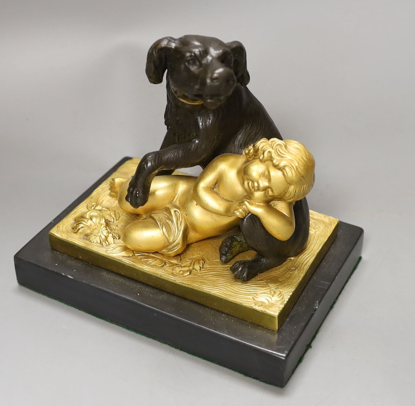 A French style gilt metal ‘urn’ inkstand/pot pourri and similar ‘dog and child’ paperweight. Tallest 19.5cm